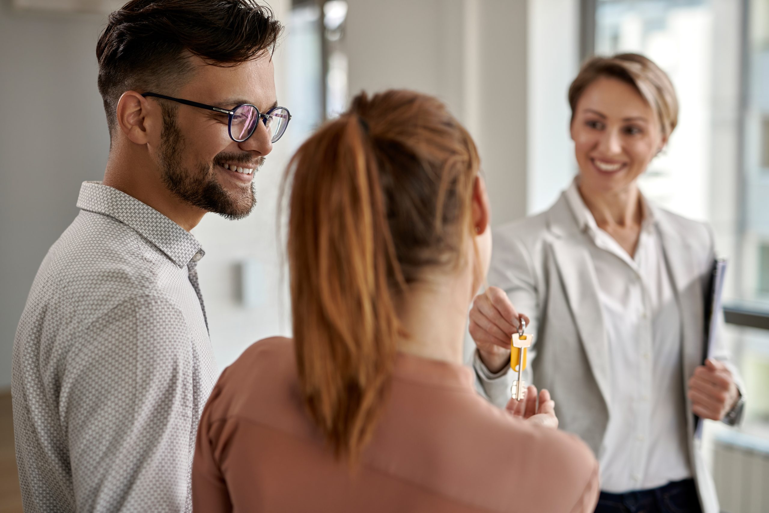 First-time homebuyers in Redondo Beach receiving keys at closing